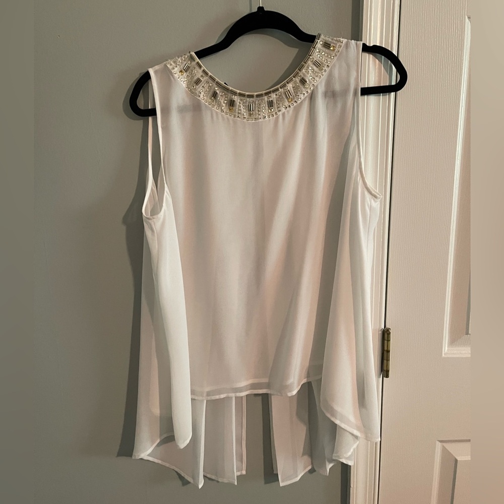 Elegant White Sleeveless Top with Embellished Neckline